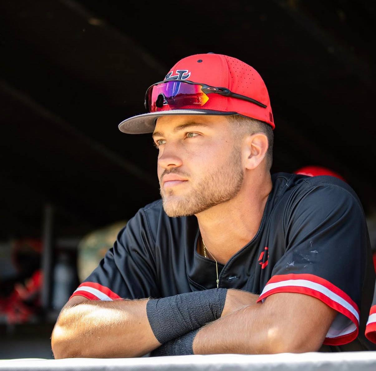 TJ Palma in the dugout at UT Tampa